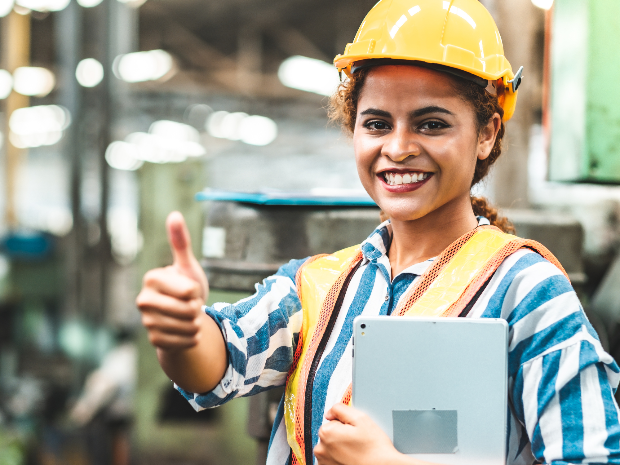 Female Engineer with Ipad and Thumbs Up