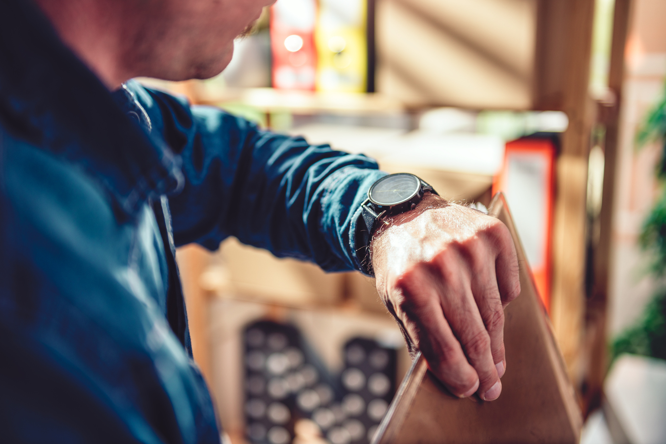 man looking at watch